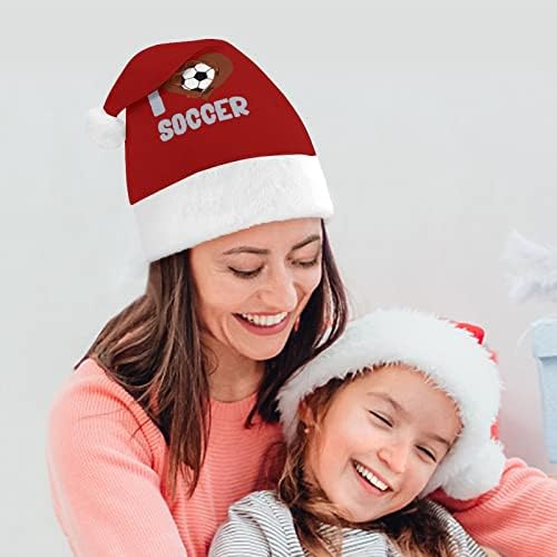 Eu amo o chapéu de natal de pelúcia de futebol travesso e bonitos chapéus de Papai Noel com borda de pelúcia e decoração