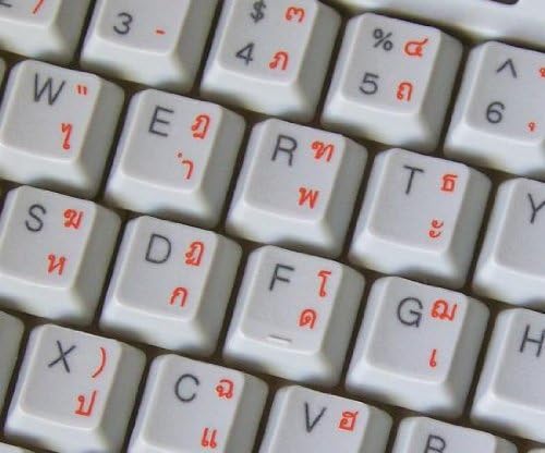 Etiquetas de teclado tailandês com letras laranja em fundo transparente para desktop, laptop e notebook
