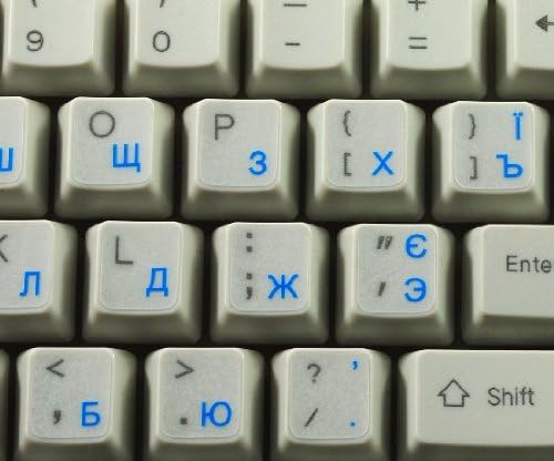 Adesivos russos de teclado russo ucraniano com um fundo transparente de letras azuis