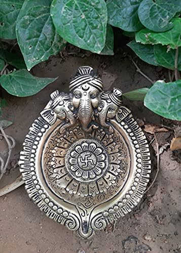 Pure Brass Metal Ganesh Face diya em financiamento fino e arte decorativa por bharat haat bh03873
